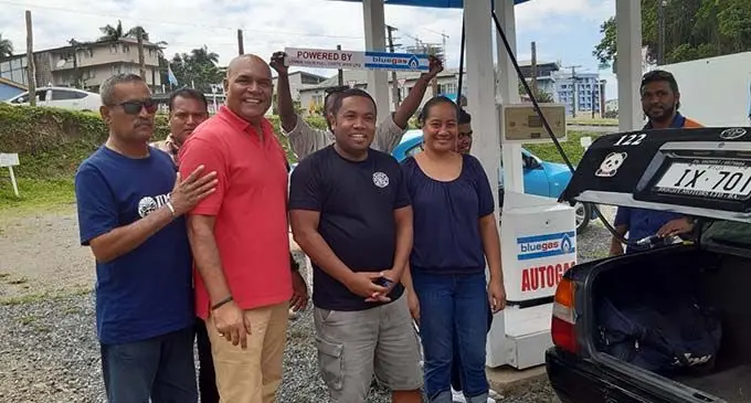  Second from left: City Central Auto Gas station owner Mike Shaw serves his first customers during the opening of the new auto gas station in Suva on November 29, 2019.  Photo: Inoke Rabonu.