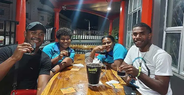 Customers enjoy drinks at the Metrople Bar & Restaurant.