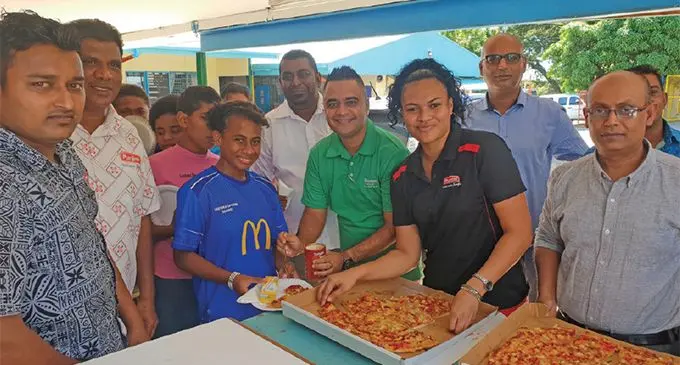 A team of Punjas Group in Lautoka provided pizza to children in Lautoka on June 14, 2019. Photo: Nicolette Chambers