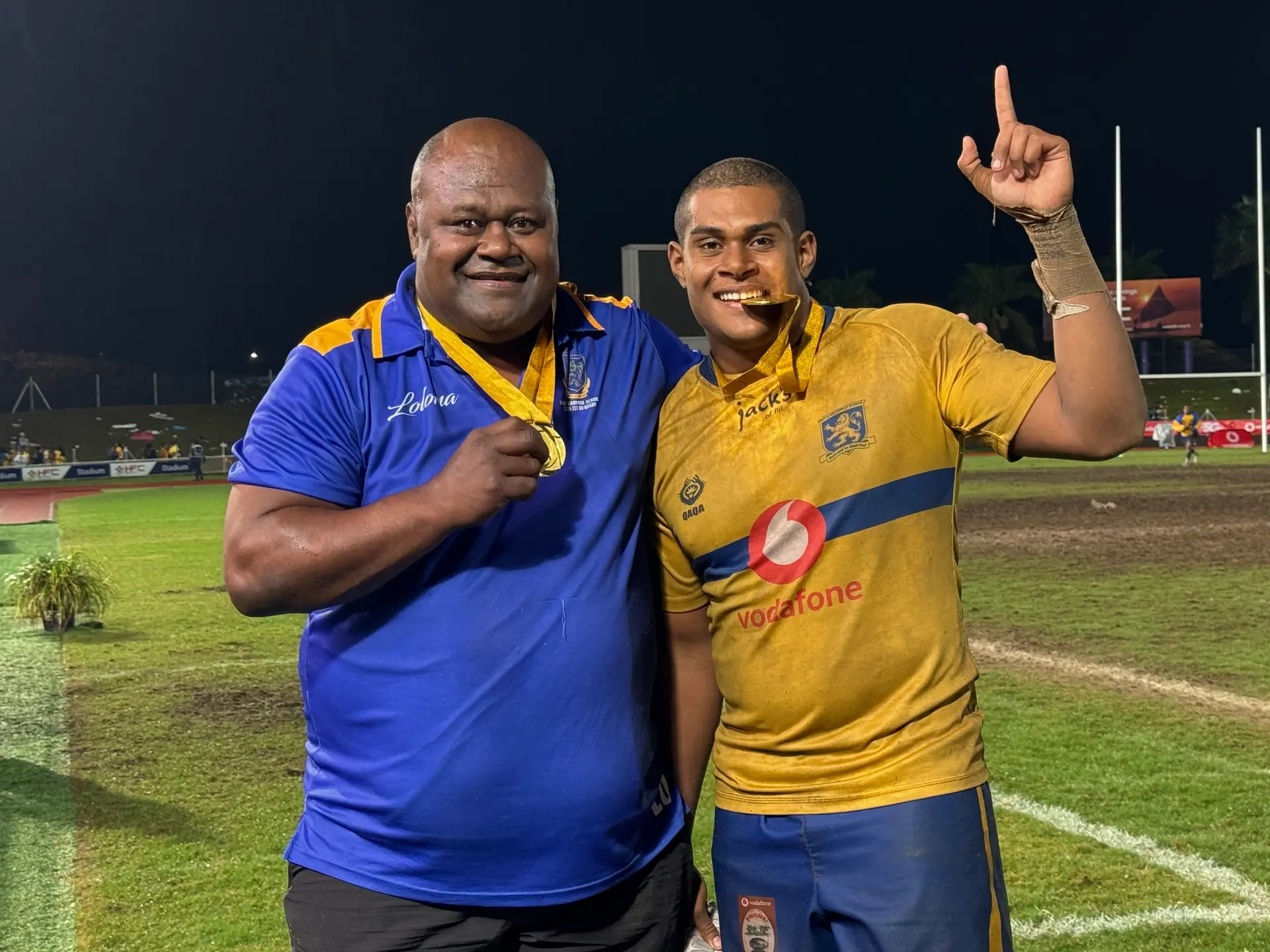 The late Suva Grammar School Under-18 coach Epeli Osborne (left) and player Nathaniel Singh following their Deans Trophy win at the National Stadium, Suva on August 22, 2026. Photo: Sereana Salalo-Baleiwai 