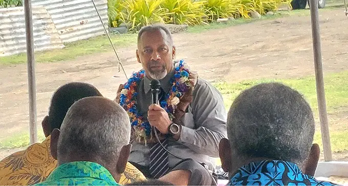The Minister for Rural and Maritime Development and Disaster Management, Sakiasi Ditoka, with community members of the Navutu and Nasowata settlements after the handover of the footcrossing on February 10, 2023.