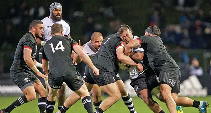 Fiji Airways Flying Fijians hooker Veremalua Vugakoto gets caught against a tight Maori All Blacks defence on July 20, 2019, at the Rotorua International Stadium, New Zealand. In support play are Captain Dominiko Waqaniburotu and Lee-Roy Atalifo. Fiji lost 17-26. Photo: Bruce Southwick/ZoomFiji