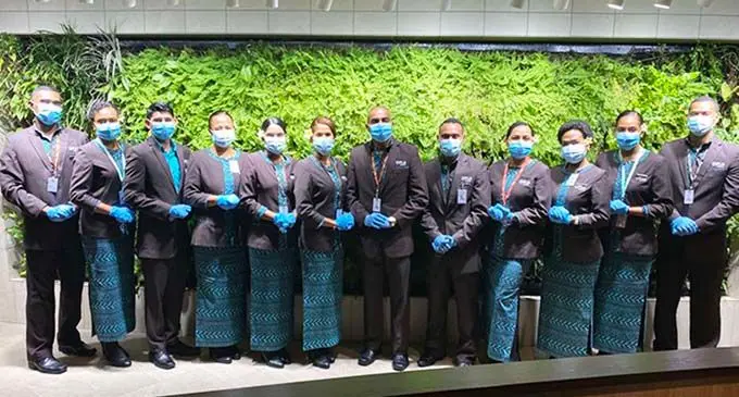 Fiji Airways Airbus A350-900 XWB cabin crew. From left: Benito Waqavou, Emma King, Sanjay Balsara (Customer Wellness Champion), Malinda Tufue, Samantha Sahayam, Melissa Chung, Manjeet Singh, Jiaoji Waqabaca, Elayna Eyre (Purser), Mere Bale, Eka Tadulala and George Mesulame in the premium lounge.
