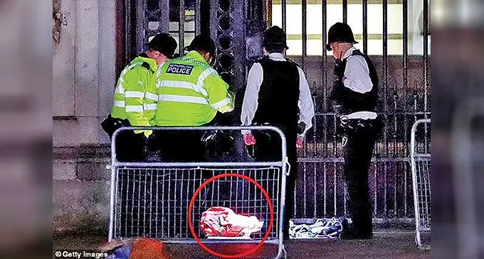 Police carried out a controlled explosion on the suspect’s bag as a precaution. Officers are pictured at the scene, by the bag. Photo: 7News