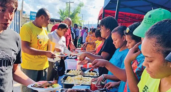 Tucker time ... Goundar Shipping Limited staff yesterday, an event organised by the company.