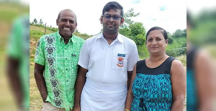 Dipshay Krishnan Reddy, is flanked by his parents Rajendra Kumaran and Subadra Devi in Tavua. Photo: Waisea Nasokia