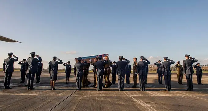 Casket of the late WO1 Vatoga flanked by members of the Royal New Zeland Defence Force as he prepares to depart New Zealand on his final journey home.