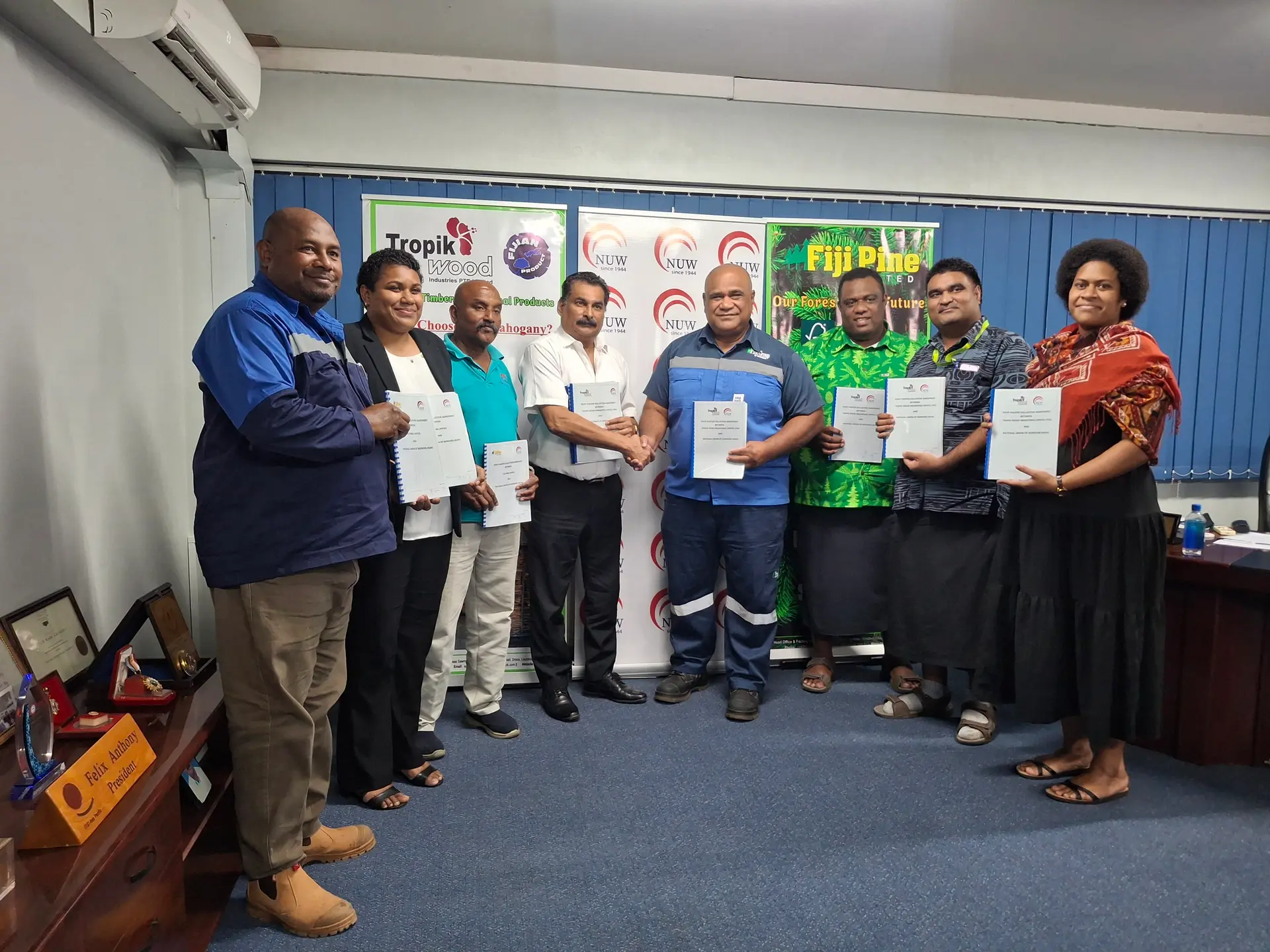 Fiji Pine Group CEO, Rakuita Vakalalabure with management and Felix Anthony with Union representatives in Lautoka.