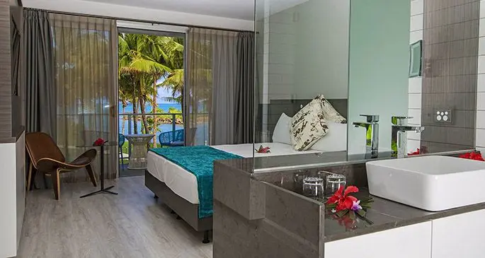Interior of a Premium Marina View room at The Pearl Resort.