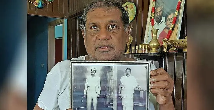 John Naiker holds up a photograph of his great grandparents, Kali Naiker and his wife Satama. Photo: Salote Qalubau