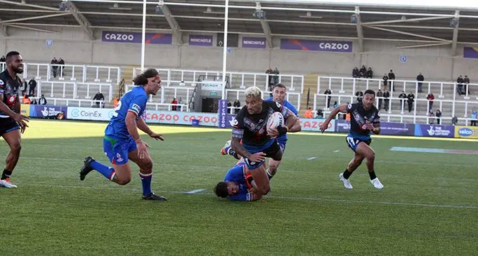 Vodafone Fiji Bati forward Viliame Kikau on attack during their game against Italy at Kingston Park, Newcastle upon Tyne, England on October 23, 2022. Photo: FNRL/Steve Mower.