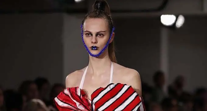 A model walks the runway at On|Off Presents... catwalk show during the London Fashion Week in London, Britain. (Xinhua/Han Yan) 