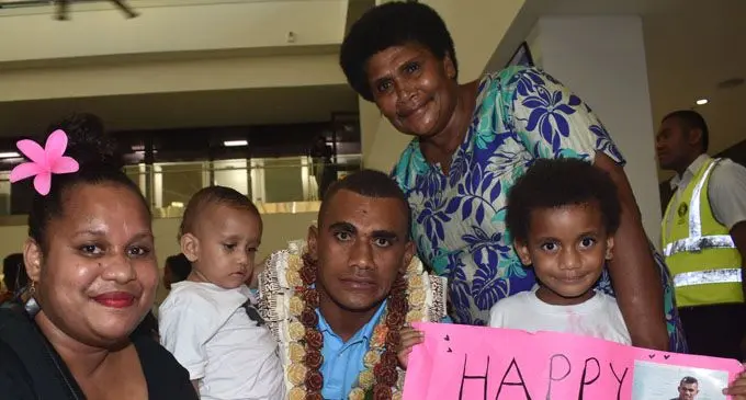 Wife Luisa Sau, daughter Grace, Fiji Airways 7's reps Eroni Sau, daughter Esther and mum Sereana Vasuitaukei celebrates the birthday at the Nadi International Airport lobby yesterday. Photo: WAISEA NASOKIA