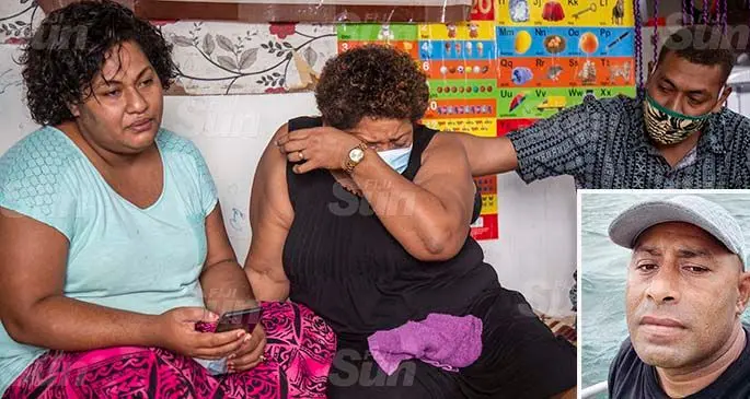 Salote Raluve (second from left), the sister of missing seaman Qiritivabea Cagilabakomeli (INSET), is consoled by family members Tima Cakacaka (left) and Kali Vakatawa at their home in Cunningham on May 24, 2021. Photo: Leon Lord