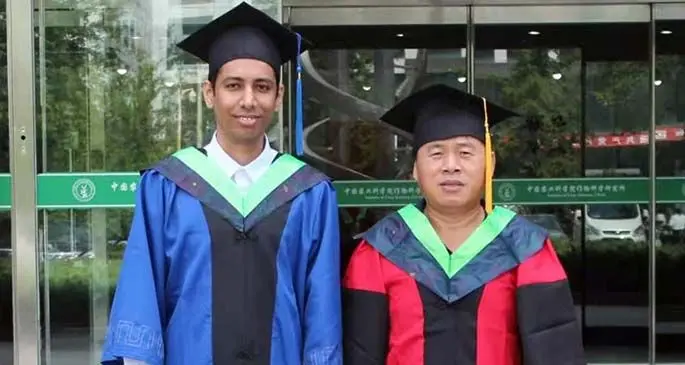 Ashmit Kumar and Professor Li Xueyong.