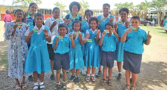 Bethel Primary School students with their vaccination cards and inked fingers after receiving the Typhoid Conjugate Vaccine in Labasa on July 31, 2023.