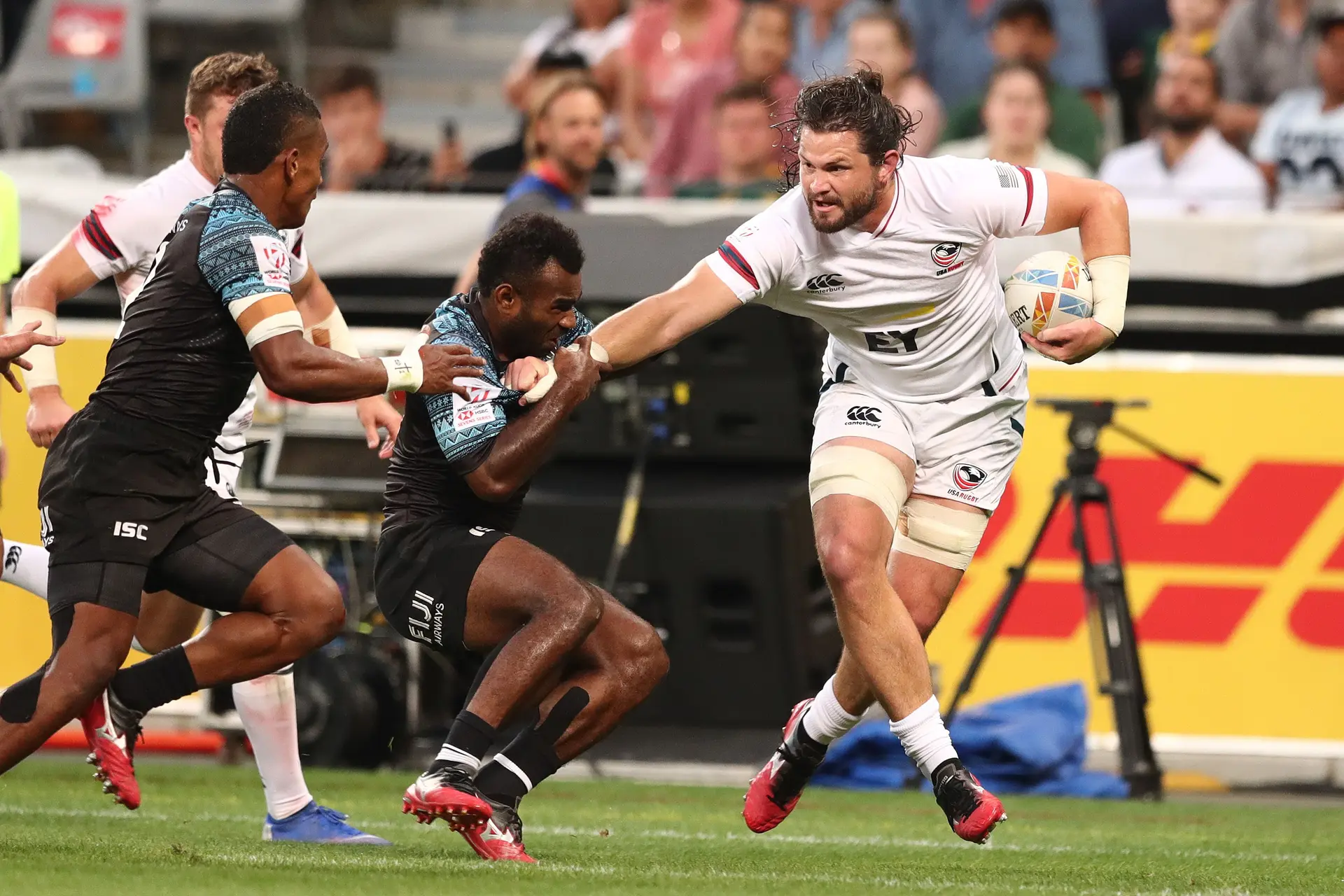 Fiji Airways Fijian 7s halfback Jerry Tuwai tries to tackle on USA prop Danny Barrett in their pool opener of the Cape Town 7s in South Africa on December 14, 2019. Fiji won 28-14. Photo: World Rugby
