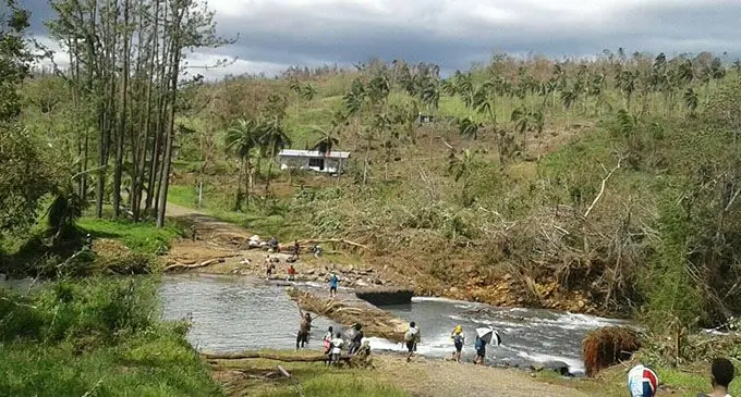 Walking from Daria to Cogea village meant crossing a broken bridge for Daria circuit members.