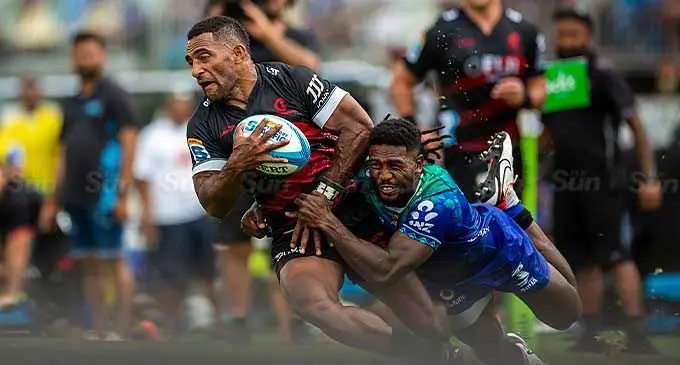 Crusaders winger Sevu Reece is tackled by Frank Lomani of the Swire Shipping Fijian Drua during their Shop N Save Super Rugby Pacific clash at Churchill Park, Lautoka, on Saturday. Drua won 20-10. They take on Chiefs on Saturday in Hamilton, New Zealand. Photo: Leon Lord