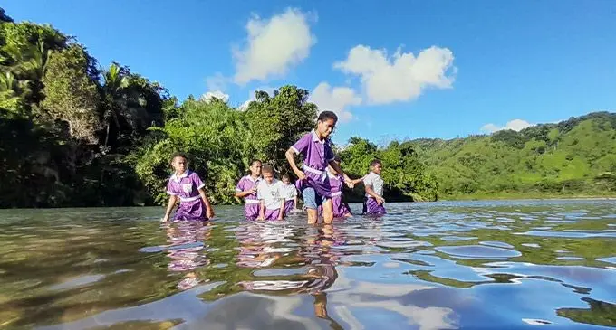 Students of Muaira District School cross rivers to get school daily. Photo: Wati Talebula-Nuku