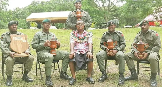 The Commissioner Western, Mesake Ledua (middle) with the Republic of Fiji Military Forces 1st Battalion Fiji Infantry Regiment Task Force Daimani (2) awardees. From left: Best Draft Senior Noncommissioned Officers, Sergeant Savenaca Kenawai, Best Overall Platoon 1, 2nd Lieutenant Timoci Vugakoto, Best Academic Recipient, Corporal Finau Tagisaya, Best Platoon in Field, 2nd Lieutenant Savenaca Lasaro and Best Rifle Shot, Private Levani Kurumudu at the Lololo Training Area in Lautoka on February 25, 2021.