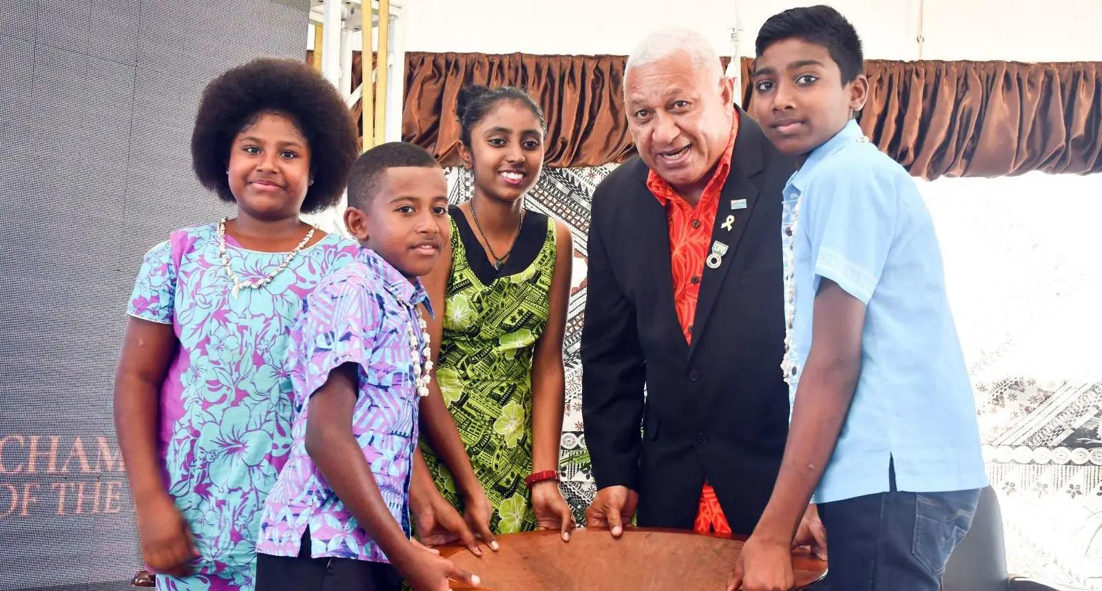 Prime Minister Voreqe Bainimarama with children receiving his 2020 Champion of the Earth for Policy Leadership award during the UN 75 Community Day at Prince Charles Park in Nadi on December 12, 2020.  Photo: Office of the Prime Minister 