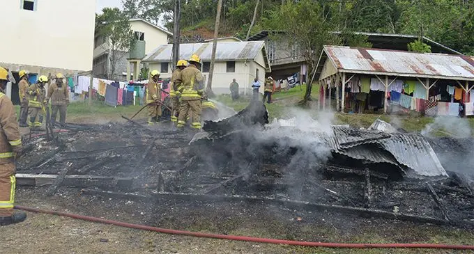 Firefighters trying to put out the remainder of the fire that burnt Q dormitory at Adi Cakobau School on March 11, 2019. Photo: Simione Haravanua