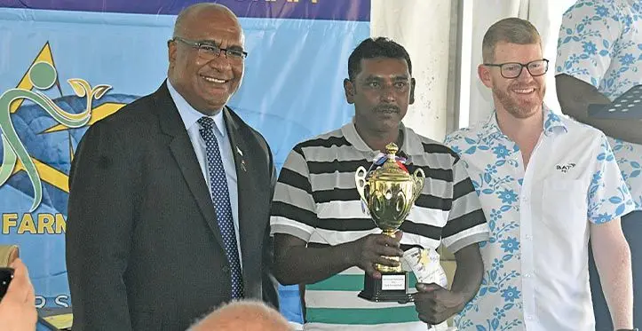 From Left: Trade Minister Manoa Kamikamica, Tobacco farmer, Ronald Singh, with British American Tobacco Fiji general manager, Sam Domor, at the 2023 BAT Fiji Star Farmer Awards at the British American Tobacco, Votualevu Nadi.