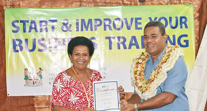 Mereoni Naikanitoba with Ministry of Trade, Co-operatives, SME’s and Communications chief business adviser for micro, small and medium enterprises (MSME’s) Iosefo Koroidimuri. Photo: Fiji Arts Council
