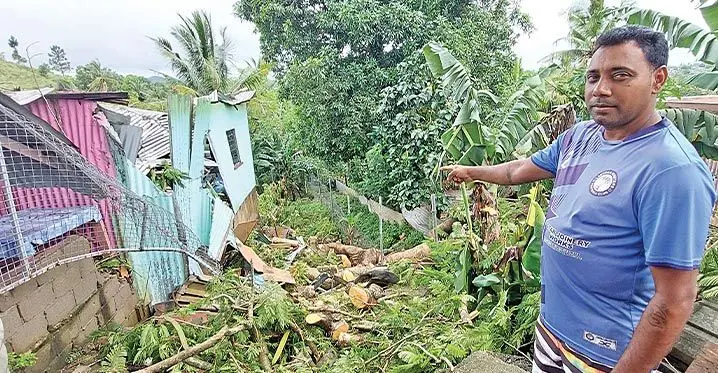 Vimlesh Kumar points to his destroyed home at Naikabula, Lautoka on March 6, 2023. Photo: Salote Qalubau