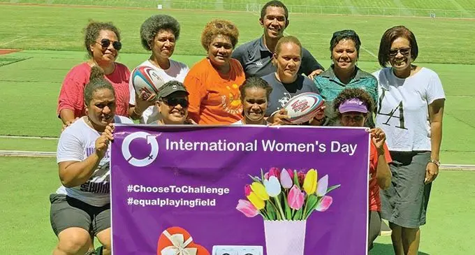 Fiji Rugby Union women’s developemnt manager, Vela Naucukidi (standing second from right) with fellow women in rugby during the International Women’s Day at Churchill Park, Lautoka on March 8, 2021. Photo: Waisea Nasokia