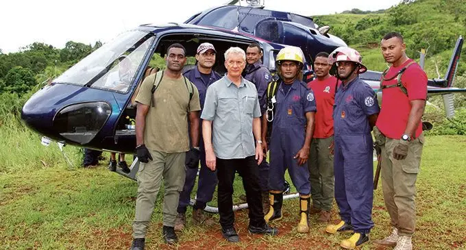 New Zealand investigator Andrew McGregor (third from left)  with a team from the Republic of Fiji Miltary Forces, Fiji Police Force and National Fire Authority at Dogoru Village in Macuata as they conducted an investigation on the Cessna 172 wreckage.
