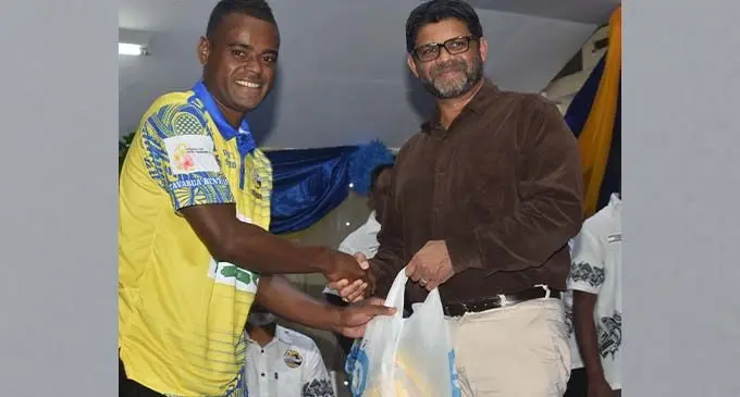 From left: Osea Vakatalesau receives his jersey from the Attorney General Aiyaz Sayed-Khaiyum at Cuvu College in Sigatoka October 4, 2020. Photo: Waisea