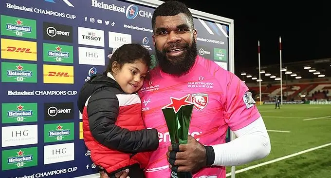 Gloucester No.8 Albert Tuisue with his daughter after receiving the Star of the Match award at Kingsholm, England, on December 11, 2022. Photo: Gloucester Rugby.