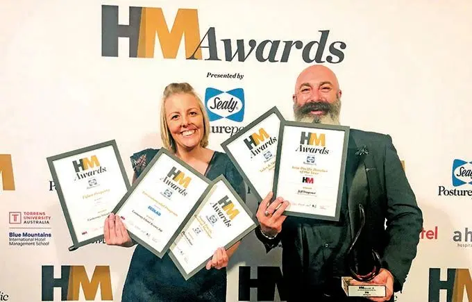 Outrigger Fiji Beach Resort Area Director of Sales and Marketing Ben Johnson (right) with the five awards won by Outrigger Hotels and Resorts during the HM Awards 2021 held in Sydney, Australia on December 3, 2021.