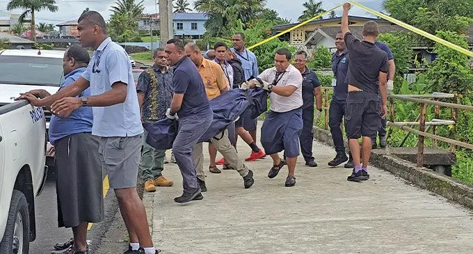 Police forensic investigators carrying the body of the deceased woman found along Rewa Street, Suva on January 27, 2025. Photo: Beranadeta Nagatalevu