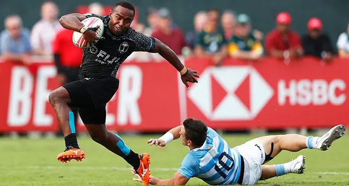 Fiji Airways Fijian 7s playmaker Waisea Nacuqu breaks through the Argentina defence during last year’s Dubai 7s tournament. Photo: World Rugby