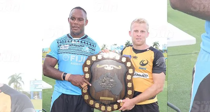 Fiji Airways Fijian Drua captain Eremasi Radrodro hands the Horan/Little Shield to Western Force captain Andrew Deegan at the ANZ Stadium, Suva on September 7, 2019. Photo: Ronald Kumar