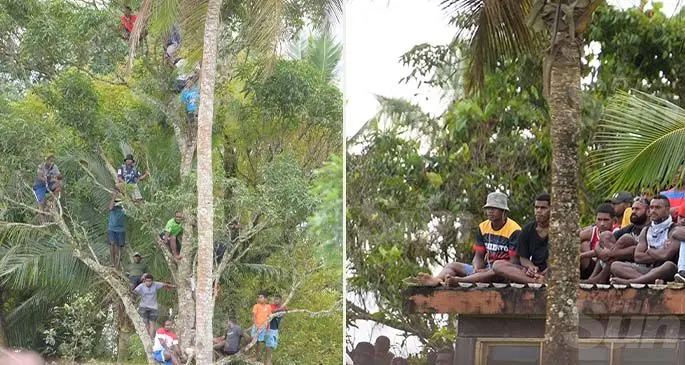 Rugby fans watching Namosi-Naitasiri double header from tree and roof tops at Thomson Park, Navua on August 8,2020. Photo: Ronald Kumar