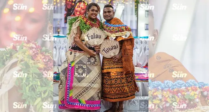 Seremaia Tuwai (right) with wife Mereani Folau after their wedding ceremony at the FMF Gymnassium on December 3, 2021. Photo: Leon Lord