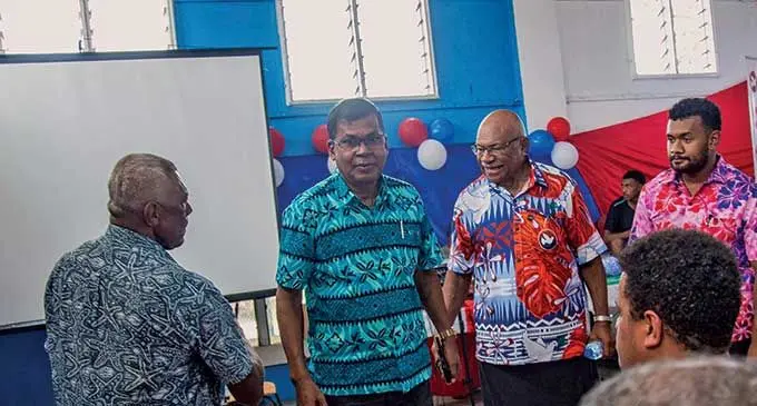 The People’s Alliance Party leader Sitiveni Rabuka and National Federation Party leader Biman Prasad during the PAP special assembly at the Vunimono hall in Nausori on March 31, 2022. Photo: Leon Lord