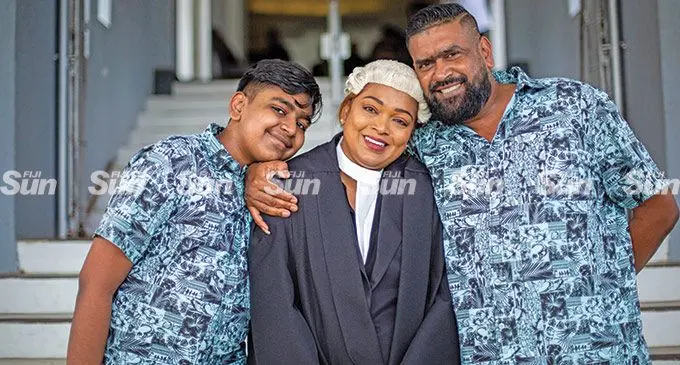 Proud family…Newly sworn in legal practitioner Shareen Lata Lal flanked by her family Mohammed Zoyel (son) and Mohammed Sharoon (husband) during the swearing in ceremony for new legal practitioners at the High Court in Suva on 18 March 2022. Photo: Leon Lord