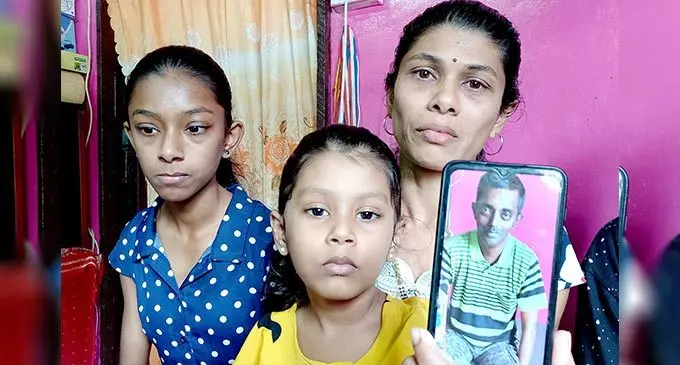 Sandhya Chand wih daughters, Anushka Lal and Anantika Lal with the picture of her missing husband Sachindra lal are hoping for safe return of husband on September 22, 2022. Photo: Ronald Kumar