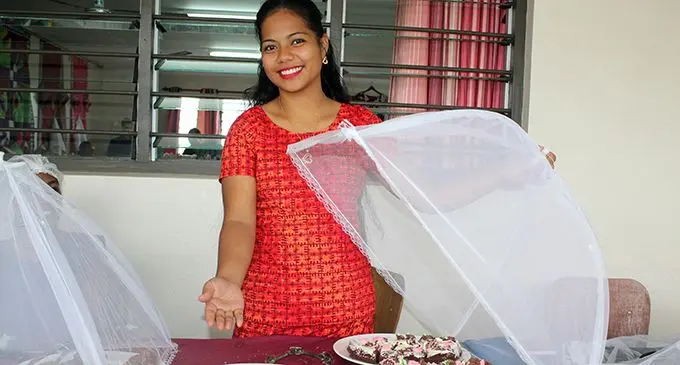 Abygail Teemoa displaying the cake she baked from the new skills she has learned during her time with the Makoi Womens Centre open day on May 4, 2019. Photo: Simione Haravanua.
