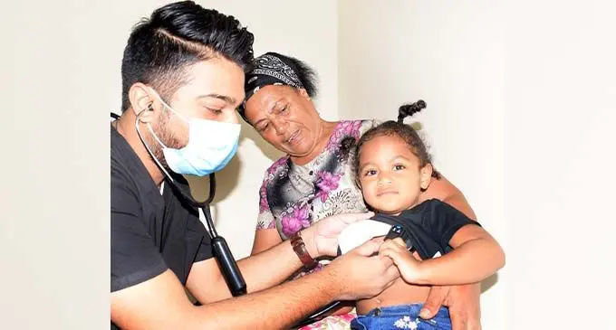 2 year-old Jimaima Dilolo of Nasole HART gets her free medical check done by Dr. Akash Singh as her grandmother, Melaia Naibui looks on during free medical checks for residents of HART at Sri Sathya Sai Sanjeevani medical Centre on September 15, 2020. Photo: Ronald Kumar