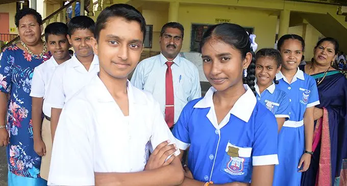 Rishikul Primary School assistant head teacher Ledua Maloloilau (from left), assistant head boy Navneel Pratap, deputy head boy Avinay Nand, head boy Ajanesh Lal, head teacher Kamal Lal, head girl Shruti Sewak, deputy head girl Miriama Lgi, assistant head girl Christine Kotoisuva with assitant head teacher Kamlesh Lata after their 2019 prefect induction ceremony on February 6, 2019. Photo: Ronald Kumar.