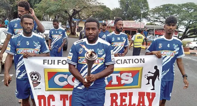 Veteran Lautoka striker Valerio Nawatu with the Courts Interdistrict Championship Torch in Lautoka on October 4, 2020. Photo: Fiji FA Media