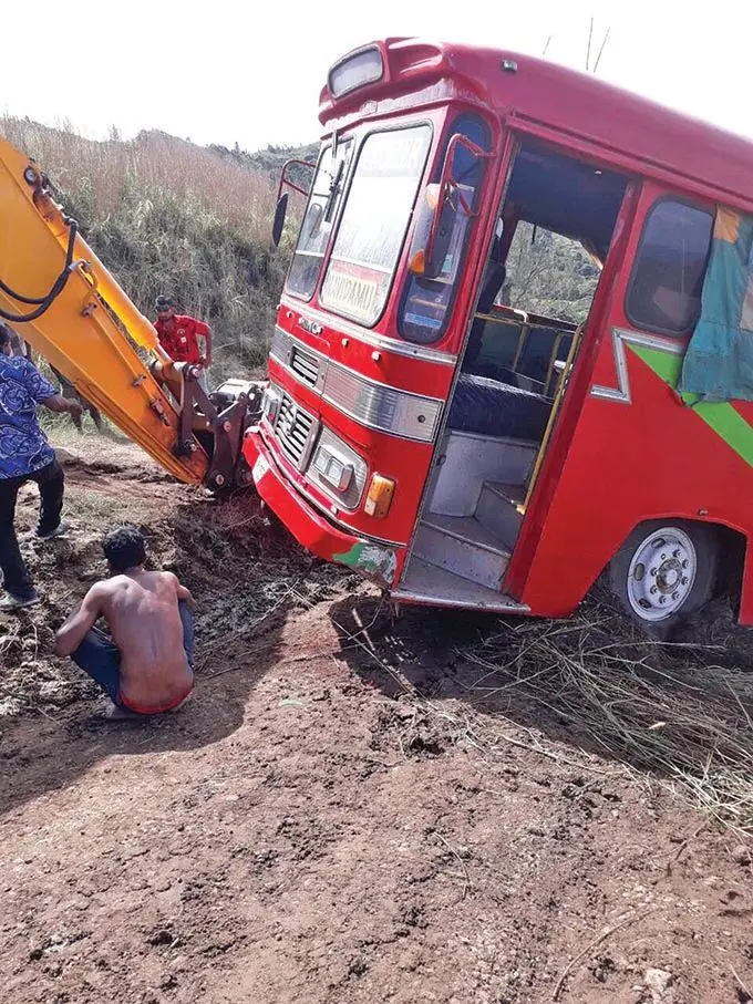 A Dalip Chand and Son Limited Bus in trouble.