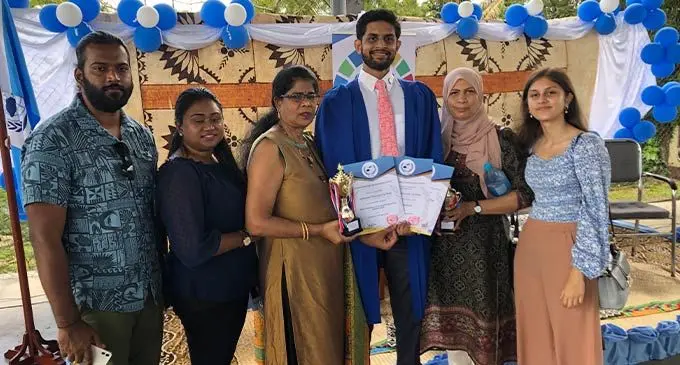 Muzzain Ud-Dean with his family at the UNA Fiji graduation on August 7, 2022. Photo: Josefa Babitu