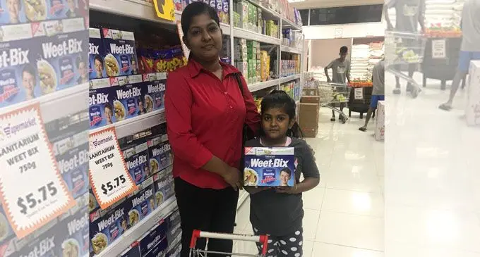 Shalin Reddy (left) and daughter Tannish Singh shopping at Charan Jeath Singh (CJS) supermarket in Nabua, Suva on April 6, 2018.  Story: Page 2. PHOTO: Nacanieli Tuilevuka